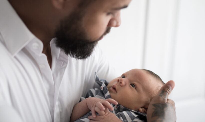 Father Holding Infant